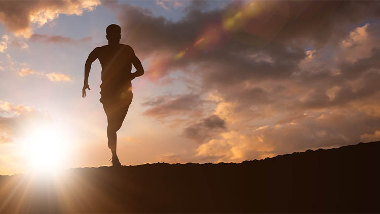 Composite image of fit man running against white background