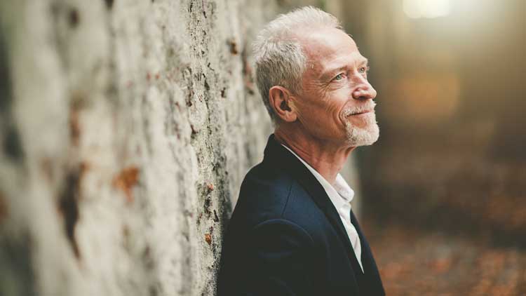 Portrait of handsome mature man, light effect