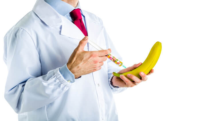 doctor giving an injection to a banana