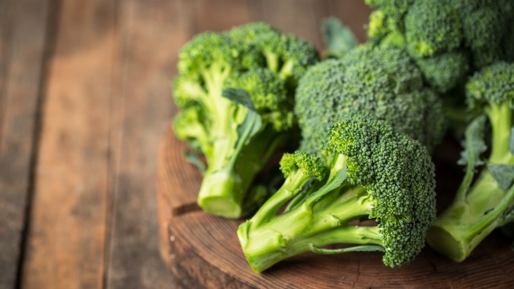 Fresh broccoli on table