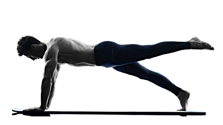 mad doing pilates excercises on a white background